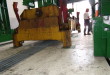 Spreader anchored to ground and jacks above provide pull test